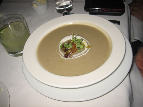 Sunchoke soup with smoked ricotta, sweet potato beignet and truffled grape vinaigrette